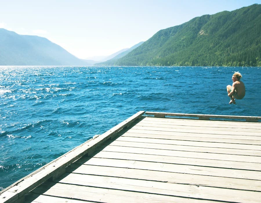 Wooden lake dock in summer